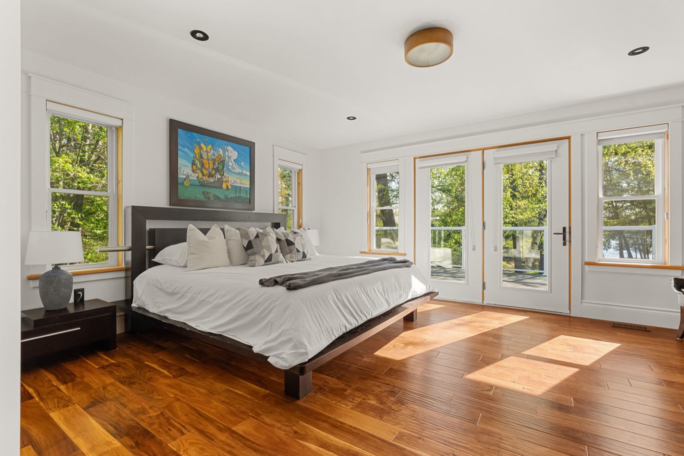 Primary suite with walkout to the lake
